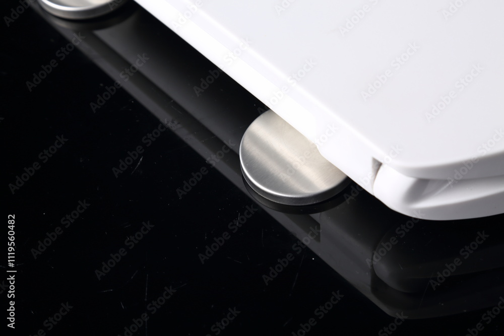 Minimalist White Toilet Seat on Black Background – Modern Bathroom Concept Minimalist White Toilet Seat on Black Background – Modern Bathroom Concept