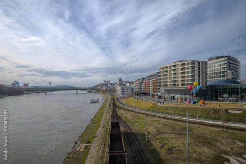 Photography Panoramic view of Bratislava with modern buildings and the Danube River