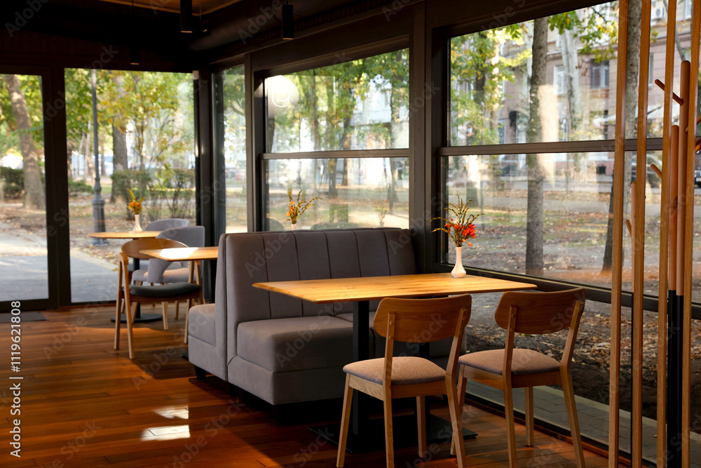 Obraz premium Stylish cafe with large windows. Interior design