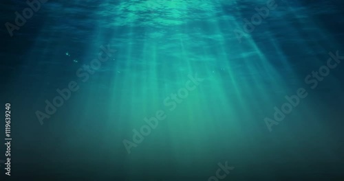 light rays, seamless loop of deep blue ocean waves from underwater background
