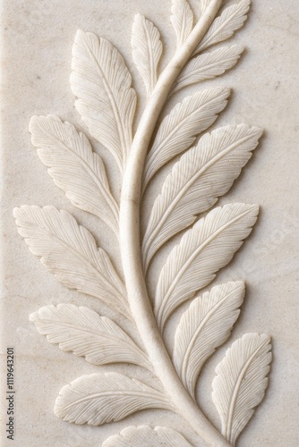 Always loved and remembered. Elegant carved leaf design on stone surface, showcasing fine detail. photo