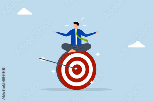 Stay focused and concentrate on business objective, calm entrepreneur contemplates while seated and concentrating on large archery bullseye. 