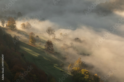 Nebelmeer im Lenninger Tal - Streuobstwiesen werden von der Morgensonne schön angestrahlt. photo