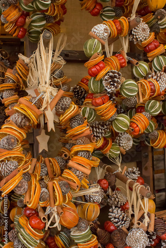 compositions of dried fruits: dried oranges, cinnamon sticks and star anise with pine cones