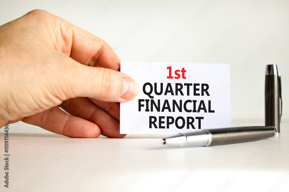 1st quarter financial report symbol. Concept words 1st quarter financial report on beautiful white paper. Beautiful white background. Business 1st quarter financial report concept. Copy space. 1st quarter financial report symbol. Concept words 1st quarter financial report on beautiful white paper. Beautiful white background. Business 1st quarter financial report concept. Copy space.