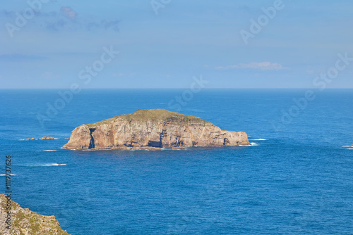 View of the Cantabrian Sea and the rocky steep island from the observation deck