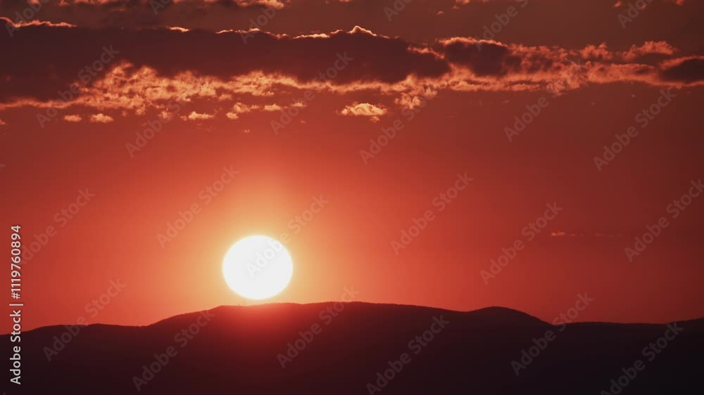 Tranquil Red Sunrise over Desert Landscape Close Up