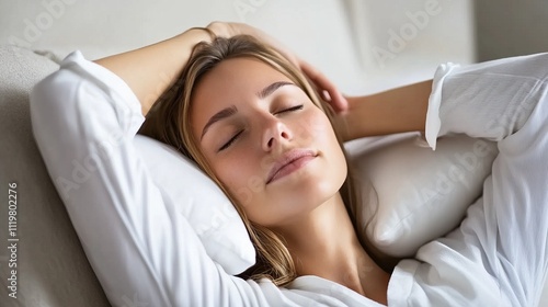 Serene Relaxation: A Peaceful Moment of Rest and Tranquility. A Woman Sleeping in Comfort on a Soft Pillow. A Picture of Calm and Contentment.