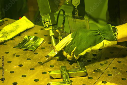 Laser welding. Hands of cra...