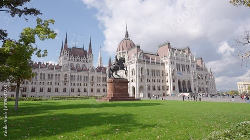 Budapest, Hungary - October 12, 2024: Equestrian statue of Ferenc Rakocz in front of the Hungarian Parliament, a masterpiece of gothic architecture in Budapest city, Hungary, Europe.