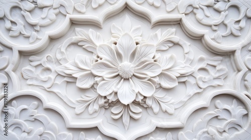 Intricate floral relief patterns on pristine white walls of a Muslim temple showcasing elegant craftsmanship and delicate artistry.