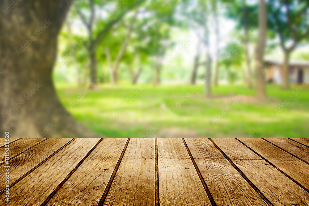 Wood floor with blurred trees of nature park background and summer season, product display montage Wood floor with blurred trees of nature park background and summer season, product display montage