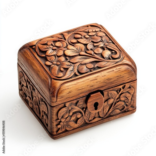 Intricately carved wooden jewelry box with floral patterns, isolated on white background. photo