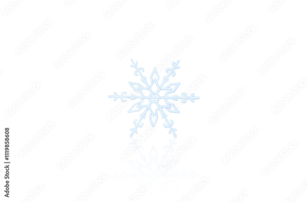 Glitter decorative snowflake isolated on white background. Christmas tree decoration. Close-up. Glitter decorative snowflake isolated on white background. Christmas tree decoration. Close-up.