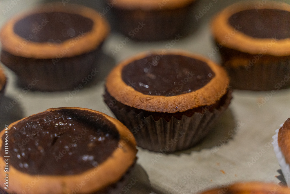 Savor the irresistible aroma of freshly baked egg tarts, a delightful blend of golden, flaky pastry and smooth, creamy custard filling. This traditional treat, loved for its rich texture Savor the irresistible aroma of freshly baked egg tarts, a delightful blend of golden, flaky pastry and smooth, creamy custard filling. This traditional treat, loved for its rich texture