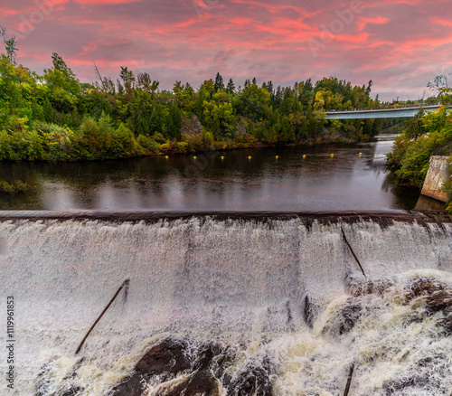 A view towards the top of the Montmorency falls near Quebec City, Canada at sunset in the fall photo