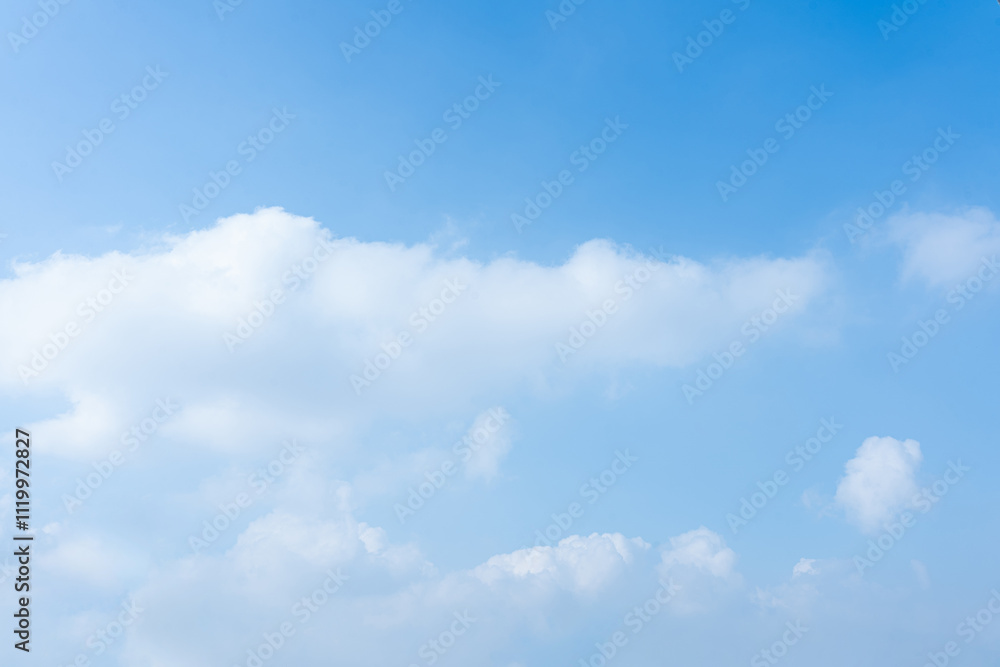 Serene Blue Sky with Fluffy White Clouds Background Serene Blue Sky with Fluffy White Clouds Background