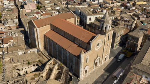 Aerial view of the Basilica of Santa Maria Assunta in the historic center of Lucera, in province of Foggia, Puglia, Italy. The cathedral of the town is dedicated to the Assumption of the Virgin Mary. photo