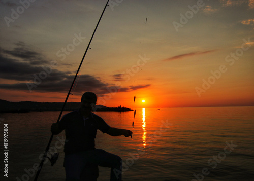 fishing at sunset
