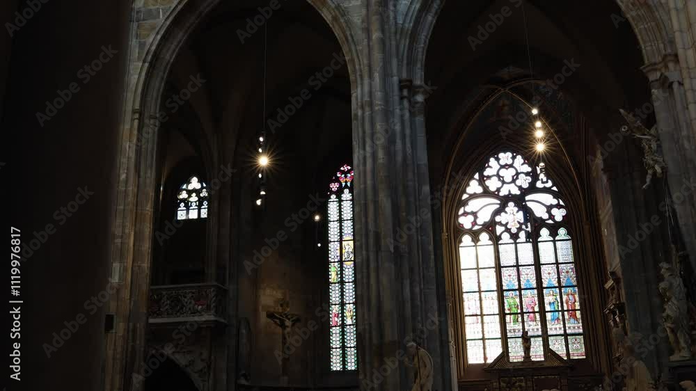 A serene interior of a cathedral with towering Gothic arches, vibrant stained glass windows, and intricate sculptures. The interplay of light and shadows creates a sacred and tranquil atmosphere. A serene interior of a cathedral with towering Gothic arches, vibrant stained glass windows, and intricate sculptures. The interplay of light and shadows creates a sacred and tranquil atmosphere.