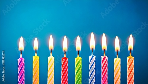 Obraz na płótnie 9 birthday candles in a row on a blue backdrop w salonie