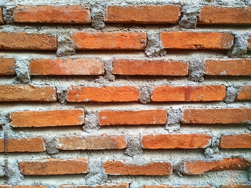 Close up red brick wall photo