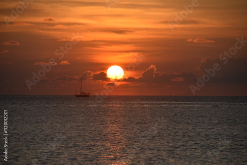 Orange Sunset over the Pacific Ocean at Malalo Island in Fiji