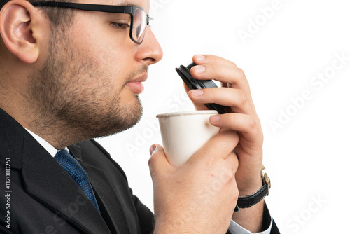 Close-up of businessman smelling morning coffee to go from cup photo