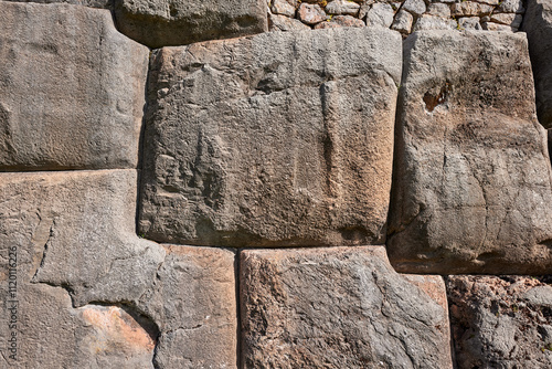 Ancient strength etched in stone.Sacsayhuamán stands as a testament to the brilliance of Inca engineering and craftsmanship. These massive, interlocking stones have weathered centuries. Cusco Peru photo