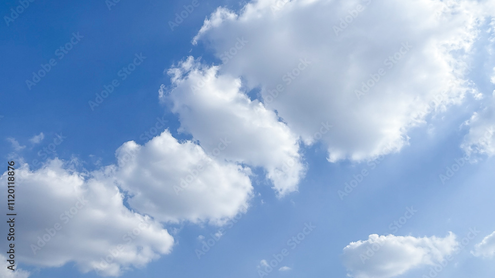 blue sky background with a group of white clouds blue sky background with a group of white clouds