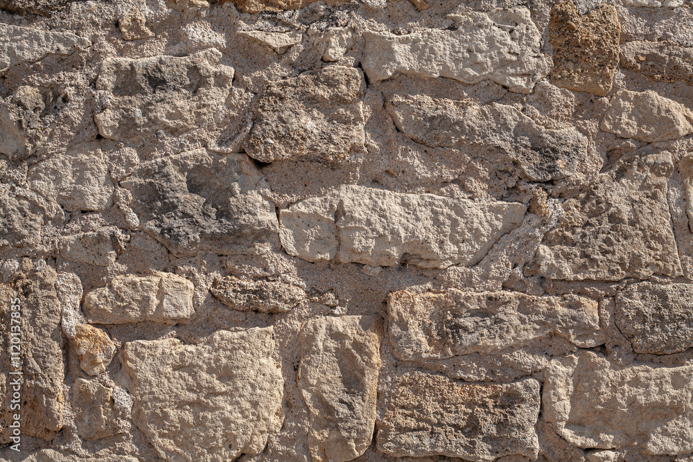 Fototapeta premium Ancient Beige Stone Wall Texture