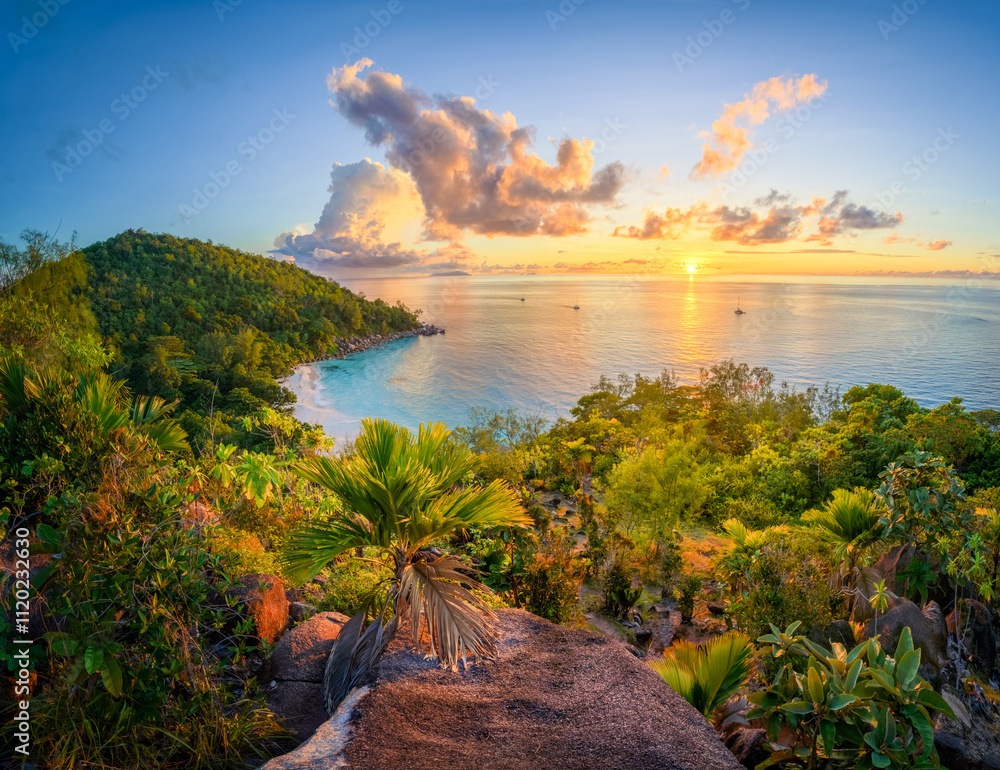 sunset at tropical beach anse georgette on praslin on the seychelles