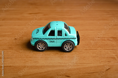 One small toy car stands on the surface