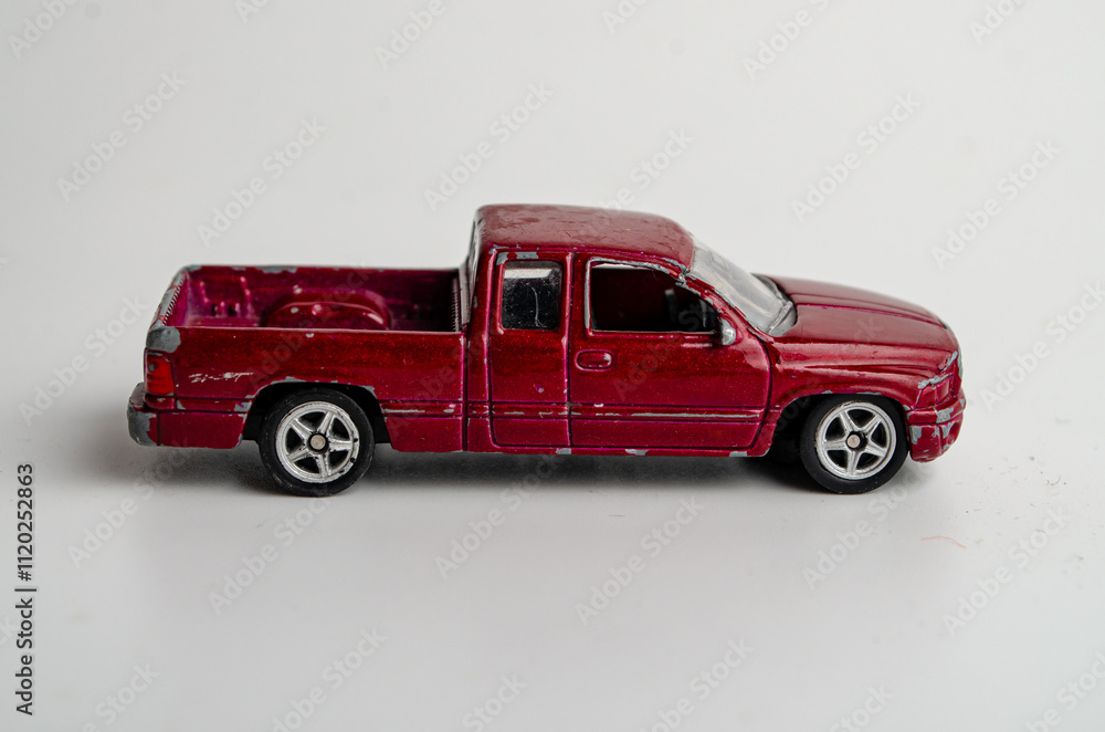 model of a small toy car made of plastic on a white background model of a small toy car made of plastic on a white background