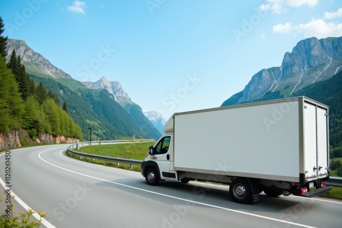 Delivery Van on Scenic Mountain Road Amidst Lush Greenery and Majestic Peaks under a Clear Blue Sky in Vibrant Natural Landscape
