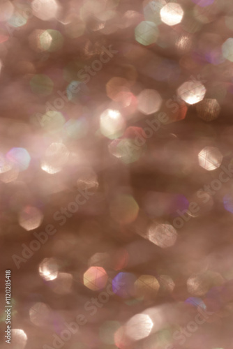 Abstract bokeh background mocha mousse colored, natural optical flare from lights, trend color year 2025, gradient color, blurr bokeh texture as Glittering aesthetic textured pattern, bege brown color photo