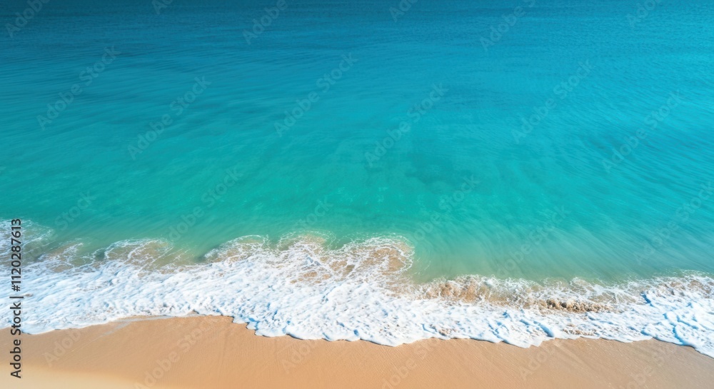 Tranquil tropical beach with gentle waves clear blue water