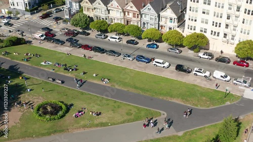 Tilting up, flying over Full House homes from Golden Gate Park in San Francisco