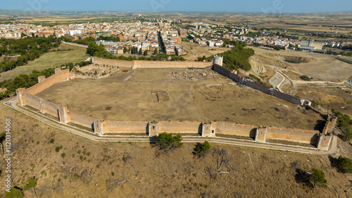 Aerial view of the Swabian-Angevin Fortress in the town of Lucera in the province of Foggia, Puglia, Italy. This castle is a historic military structure and one of the symbols of the city. photo