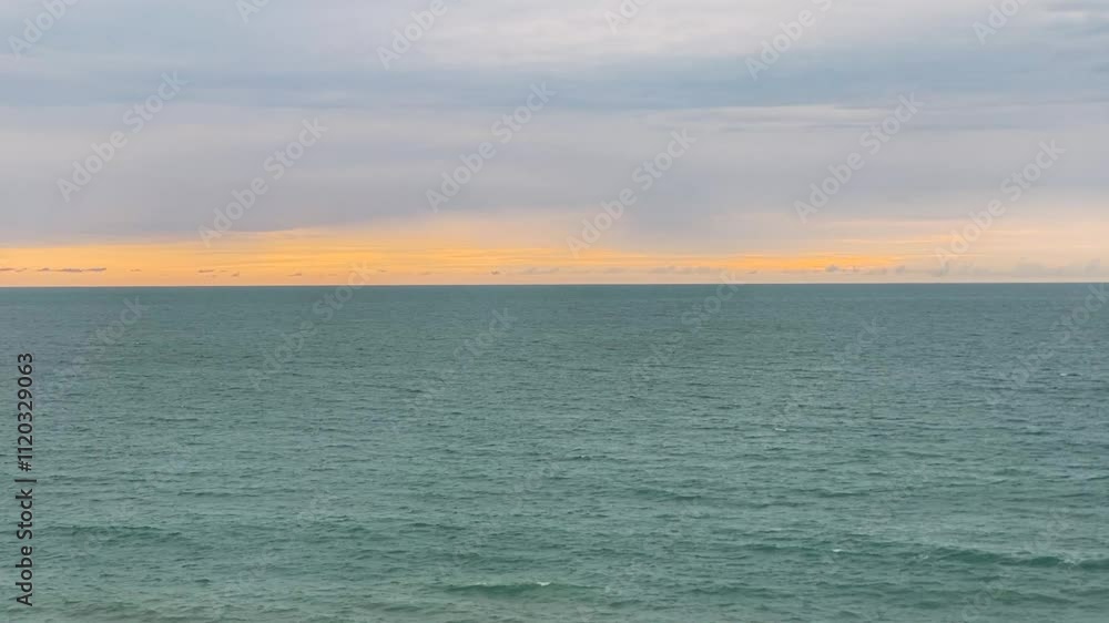 Cloudy sunset on a seacoast Cloudy sunset on a seacoast