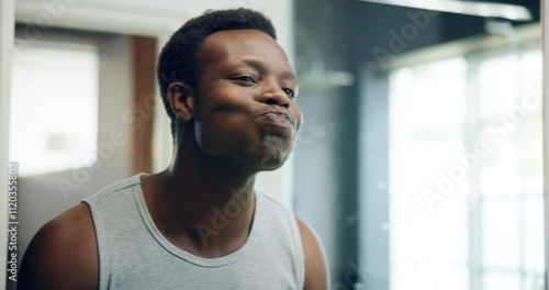 Hygiene, routine and man in bathroom, mouthwash and cleaning of mouth, dental care and oral health. Morning, mirror and rinsing of teeth with water, black person and grooming for wellness in house