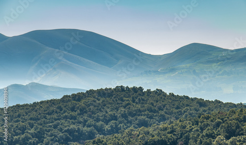 Spectacular View of a Mountain with Trees and the Sky in the Background in Amdoun, Beja, Tunisia photo