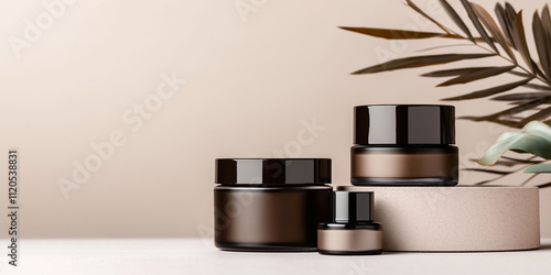 Elegant arrangement of skincare jars on a minimalist surface with greenery in soft lighting