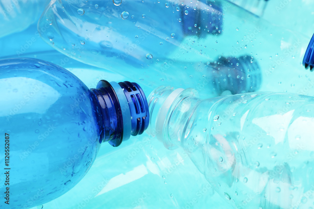 Many plastic bottles as background, closeup view Many plastic bottles as background, closeup view