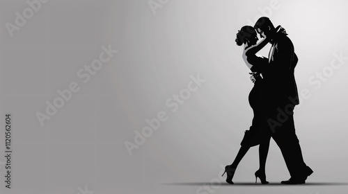 Full-length of an elegant couple dancing tango against a gray background.