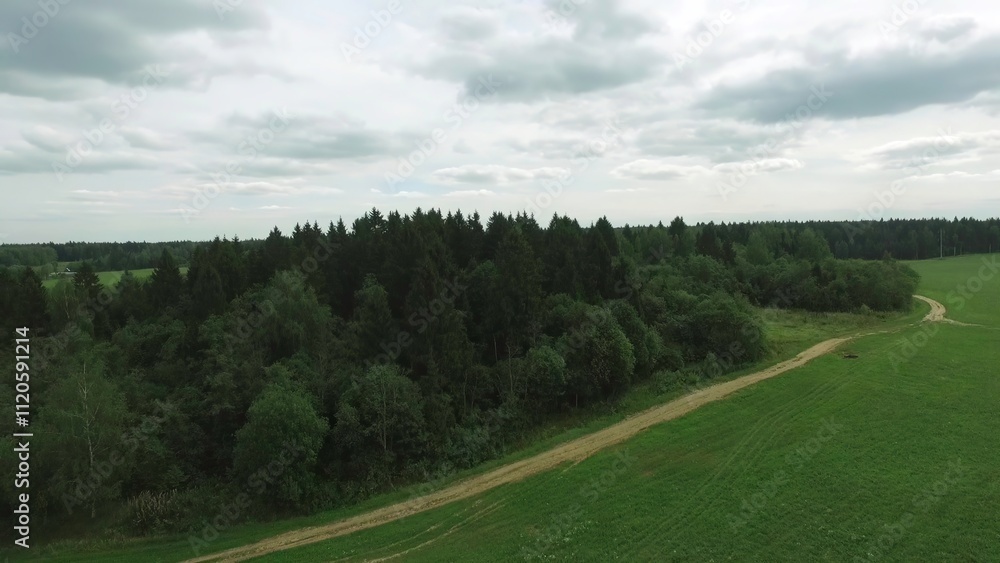 A serene aerial journey through lush fields and rolling hills A serene aerial journey through lush fields and rolling hills