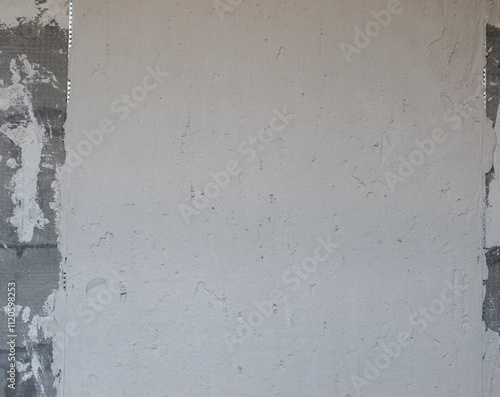 Wallpaper Mural Uneven wall with gypsum plaster. Gray rough wall with plastered surface. Finishing walls in an apartment using plaster on leveling guide profiles Torontodigital.ca