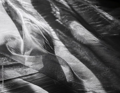 folds and tears of fabric as a dark texture as a background