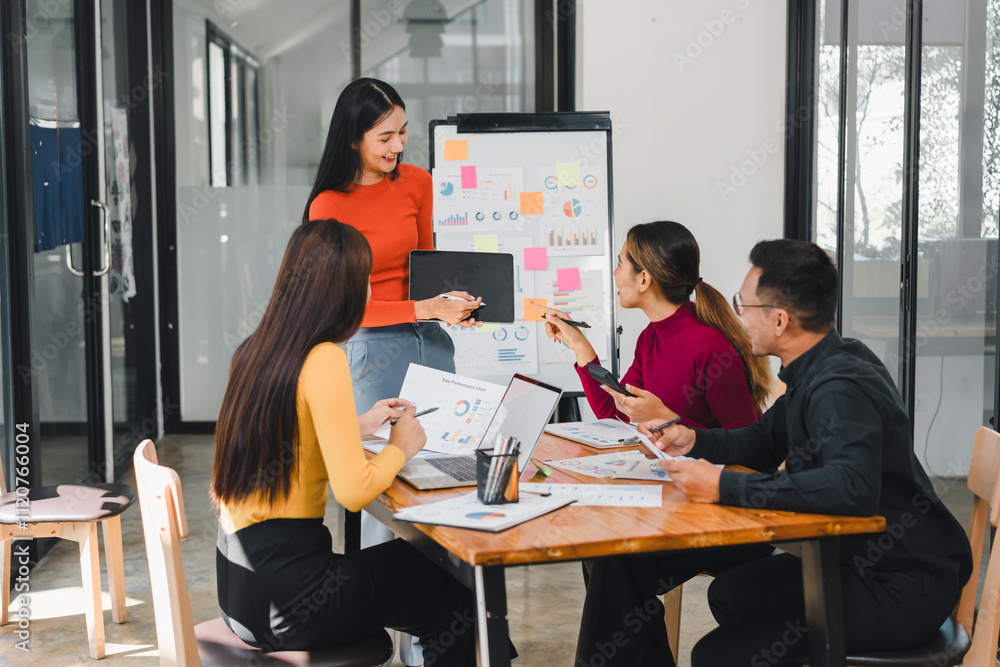 Fototapeta premium team collaborates on project with charts and sticky notes