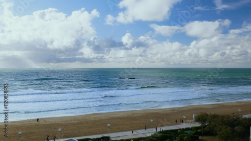 Coastal view of Biarritz on a sunny day with a beach and blue sea